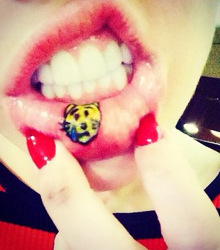 Miley Cyrus Kitty Lip Tattoo